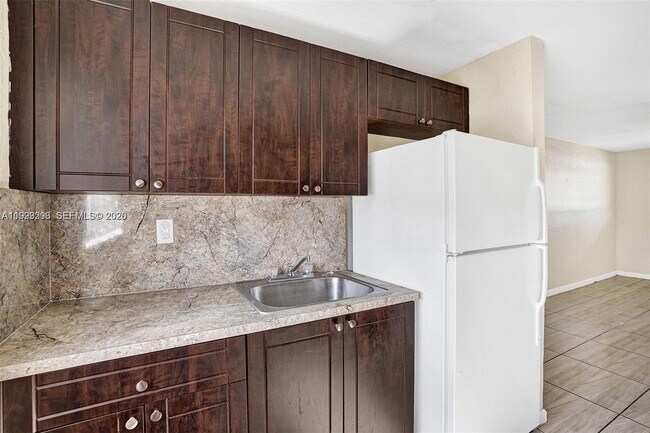 Building Photo - 5842 NW 12th Ave