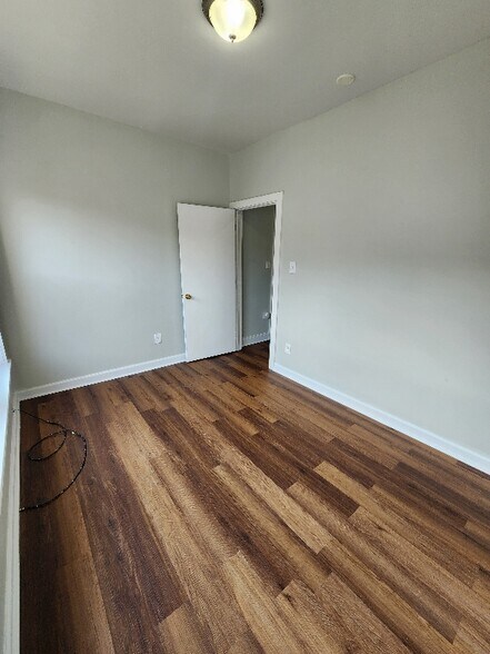 Building Photo - 11033 S Vernon Ave