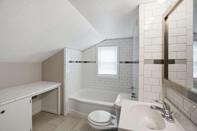 Building Photo - Expansive Living at an Unbeatable Value: Your Ultimate Multi-Level Escape!