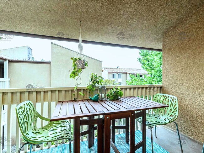 Building Photo - Top Floor Furnished Condo In The Heart Of ...