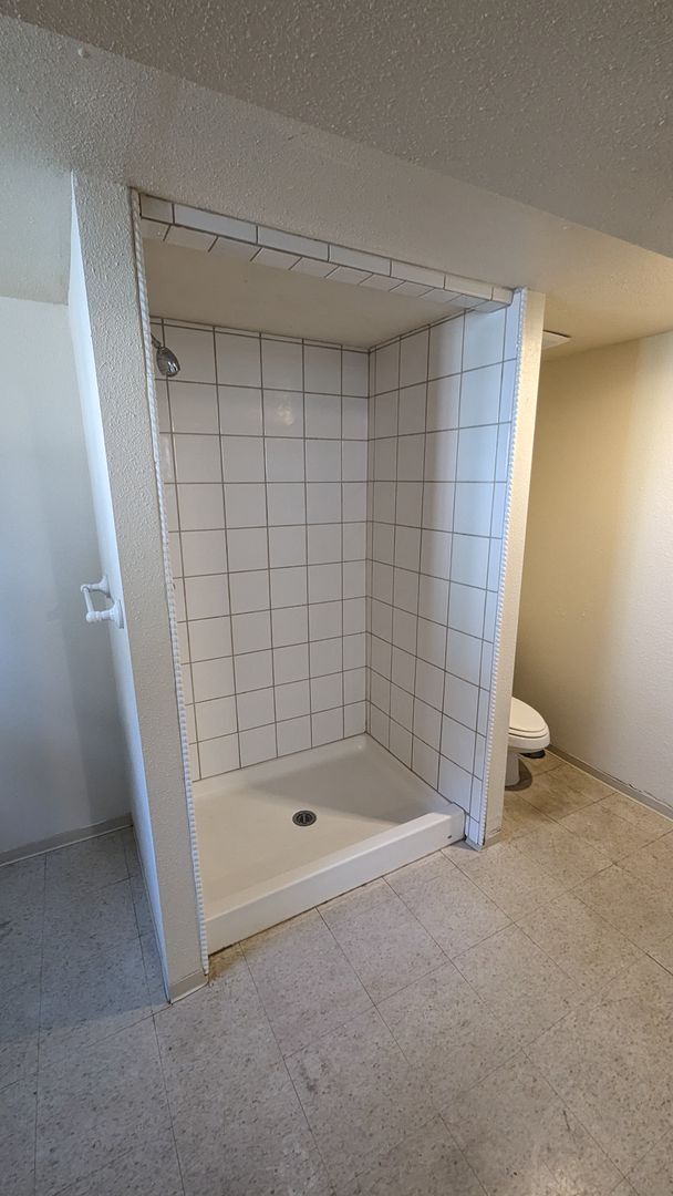 Building Photo - Spacious Three Bedroom with Large Backyard...