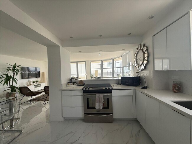 Building Photo - 5555 Collins Ave