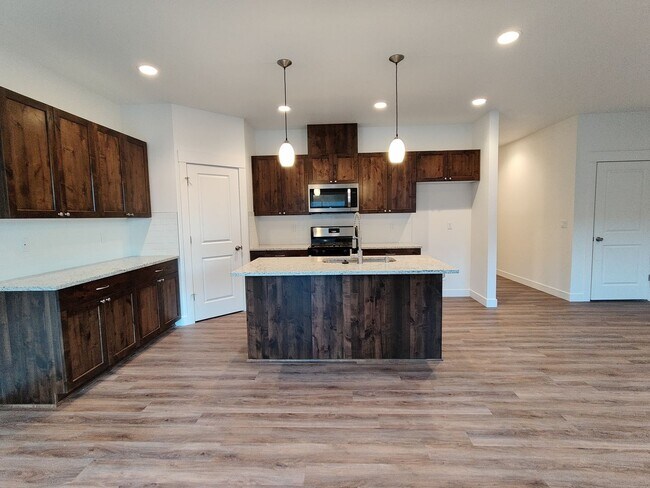 Building Photo - Contemporary Townhome with Open Floor Plan...