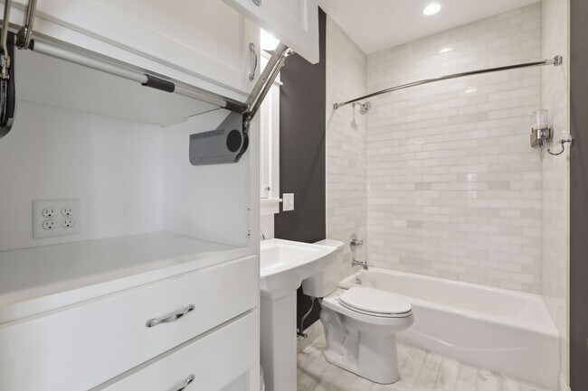 Each main level bathroom has an appliance garage with 4 plug in outlets. - 924 Eleanor Ave