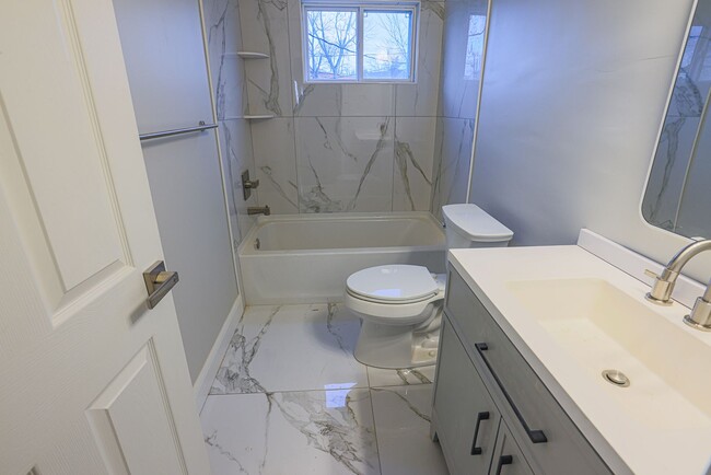 Building Photo - RENOVATED PARKVILLE TOWNHOME 3BR 1.5BA