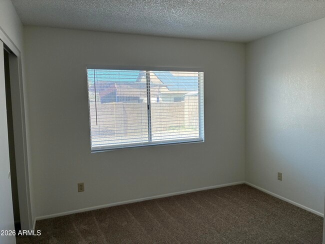 Building Photo - 10820 W Wagon Wheel Dr