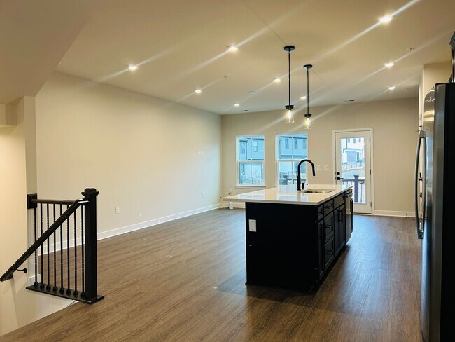 Building Photo - New Construction • 4 BR • 2 Full / 2 Half BA • End Unit Townhome in Village Town – Fayetteville’s...