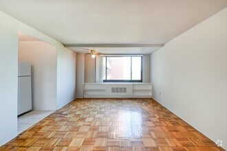 Building Photo - Spacious & Bright Junior 1 Bedroom at Rive...