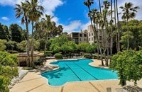 Building Photo - Elegant, private end-unit living with resort-style amenities!