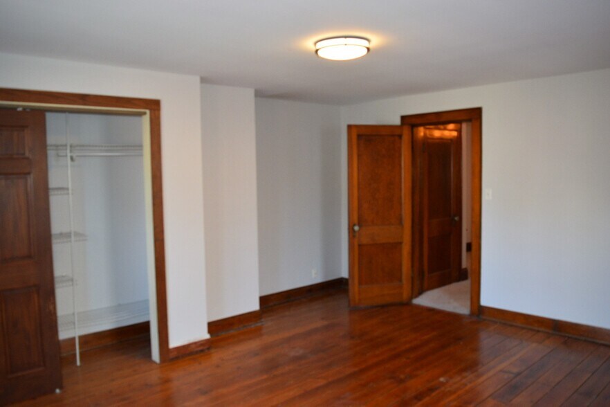 Bedroom with built in closet - 319 1/2 Jackson St