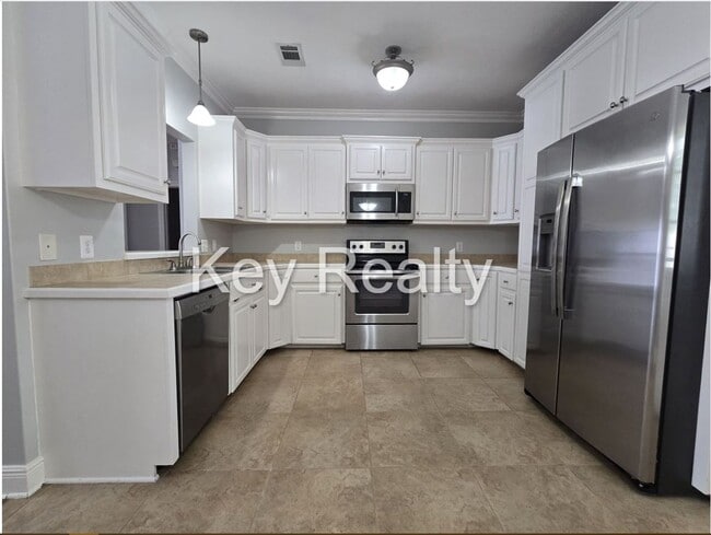 Building Photo - ****6140 Rachelle - Townhome, off Twin Bri...