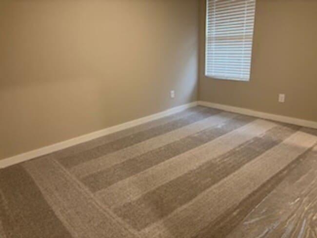 Building Photo - BRAND NEW HOME!  First month free!