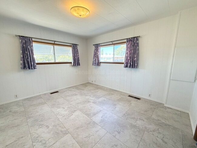 Building Photo - 10675 N Kilimanjaro Ave