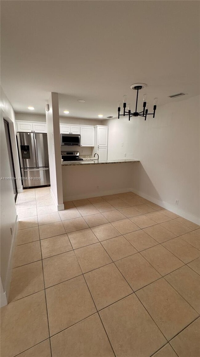 Building Photo - 3801 Cocoplum Cir