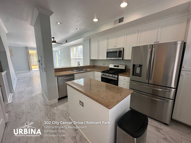 Building Photo - Modern 3-Bedroom Townhome in the Heart of ...