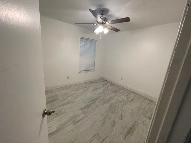 Building Photo - 6831 Tiki Ln