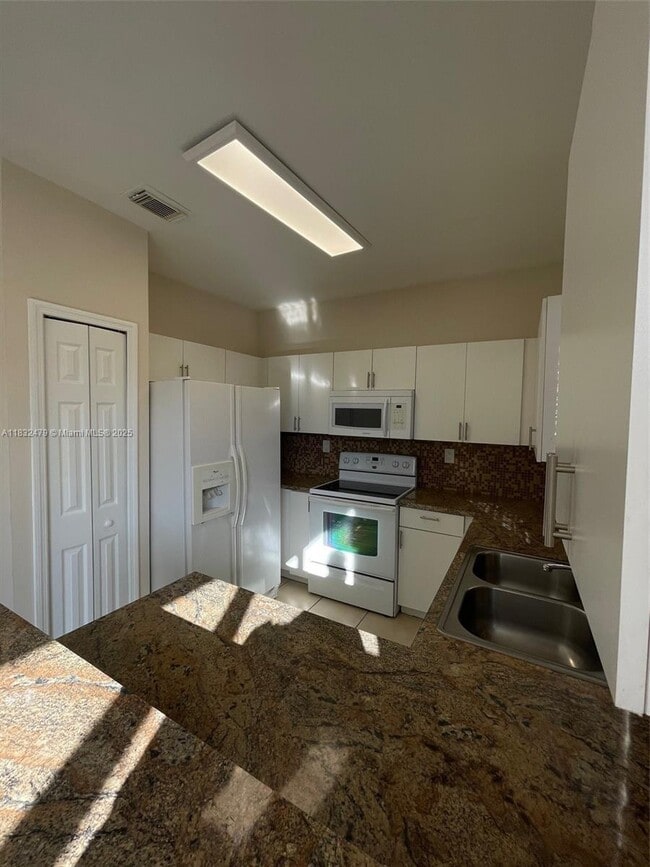 Building Photo - 13850 SW 274th Terrace