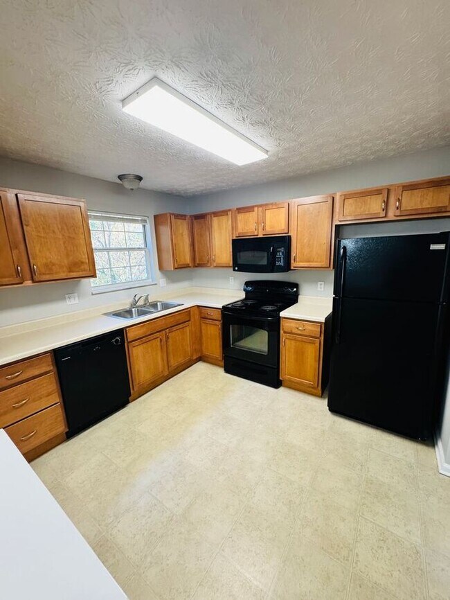 Building Photo - Split-Foyer Charm with Modern Upgrades in West Knox