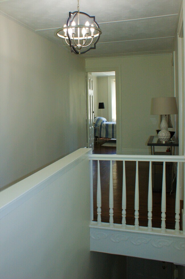 Long hallway leads to 3 bedrooms - 35 Coggeshall Ave