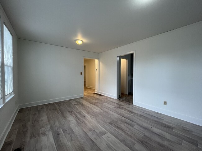 Building Photo - Expansive 4BR 2,900+ Sq Ft Home with Theater-Style Living Room & Bonus Hobby Workshop