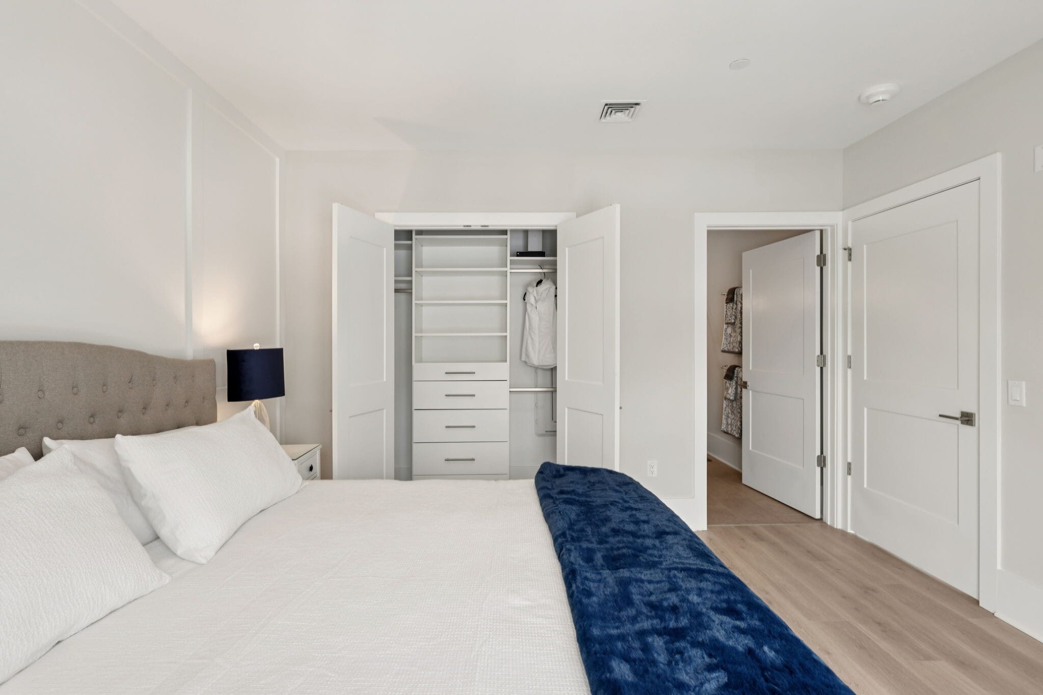 Primary Bedroom with Custom shelving in the Closet - 215 2nd Ave