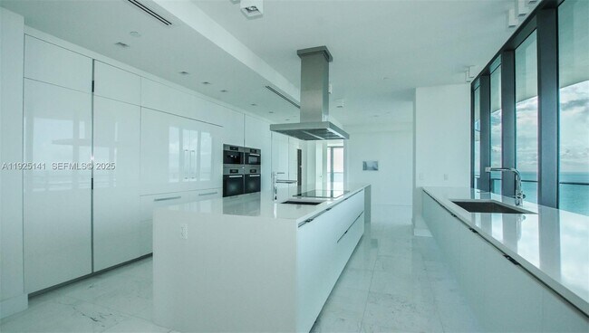 Building Photo - 19575 Collins Ave