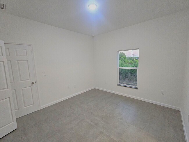 Building Photo - Brand New 2/2/1-Great Location- SW Lehigh Acres