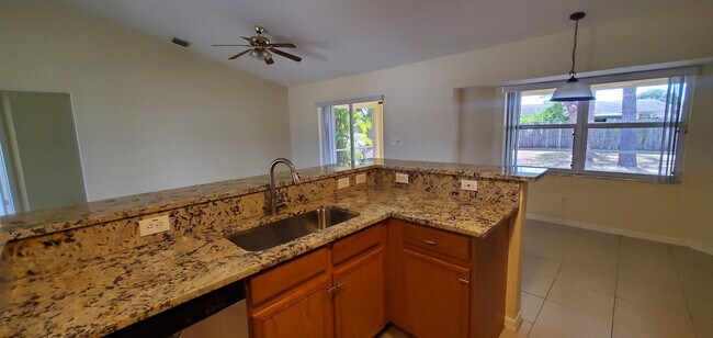 Building Photo - Experience the perfect blend of comfort and style in this charming 3-bedroom, 2-bathroom corner l...