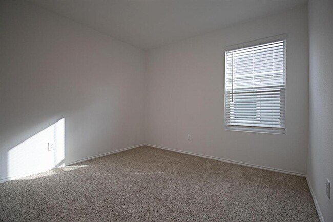 Building Photo - 5701 Manarchos Ln