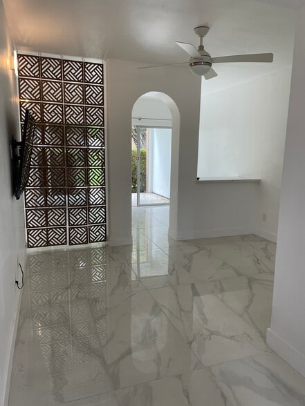 Open floor plan with divided living and sleeping area - 6125 E Indian School Rd