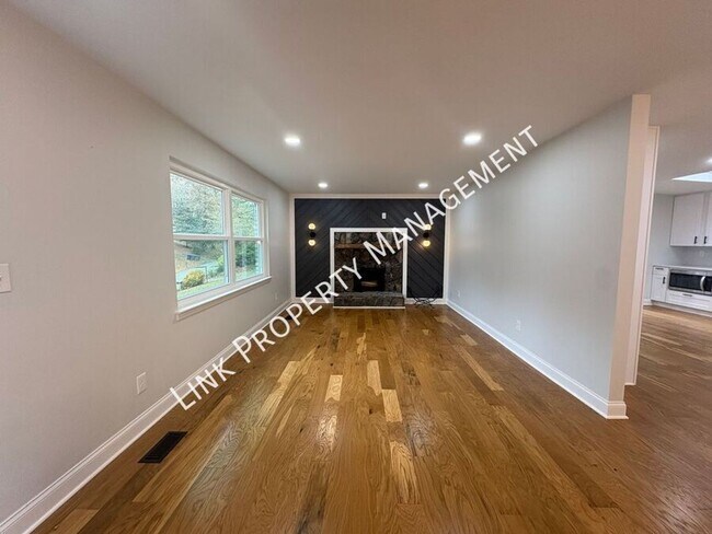 Building Photo - JUST REDUCE!  Sophisticated Tri-Level Home in Stuart Heights — Modern Comfort & Timeless Charming...