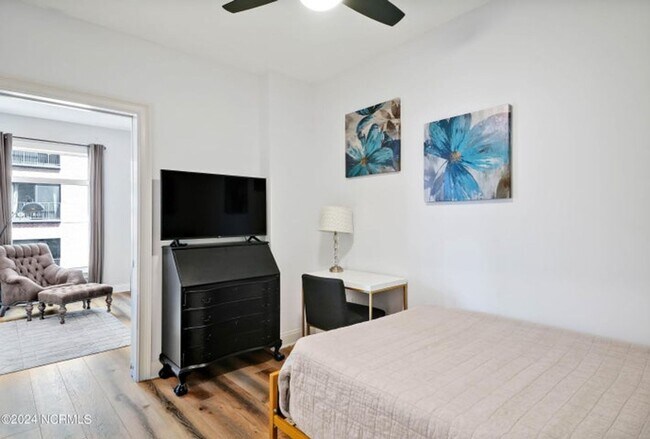 Building Photo - Welcome to your dream condo in the heart o...
