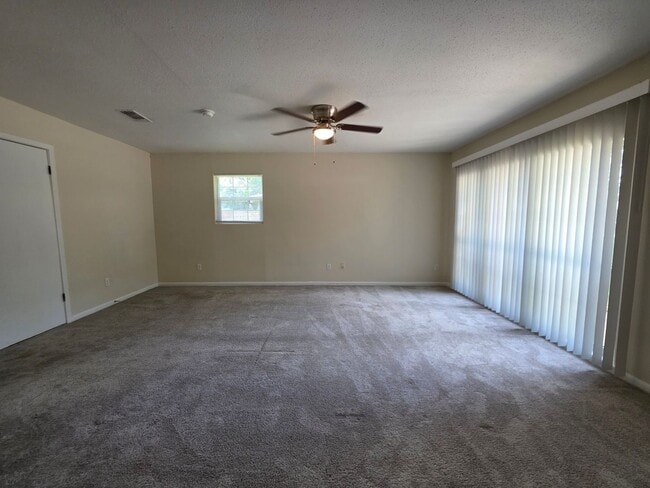 Building Photo - Nicely updated 3BR/1.5BA with fenced in ba...