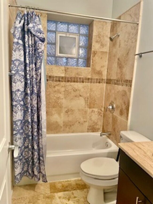 Building Photo - Breathtaking, Fully Furnished 2-Bedroom, 2-Bath Condo Near Medical District