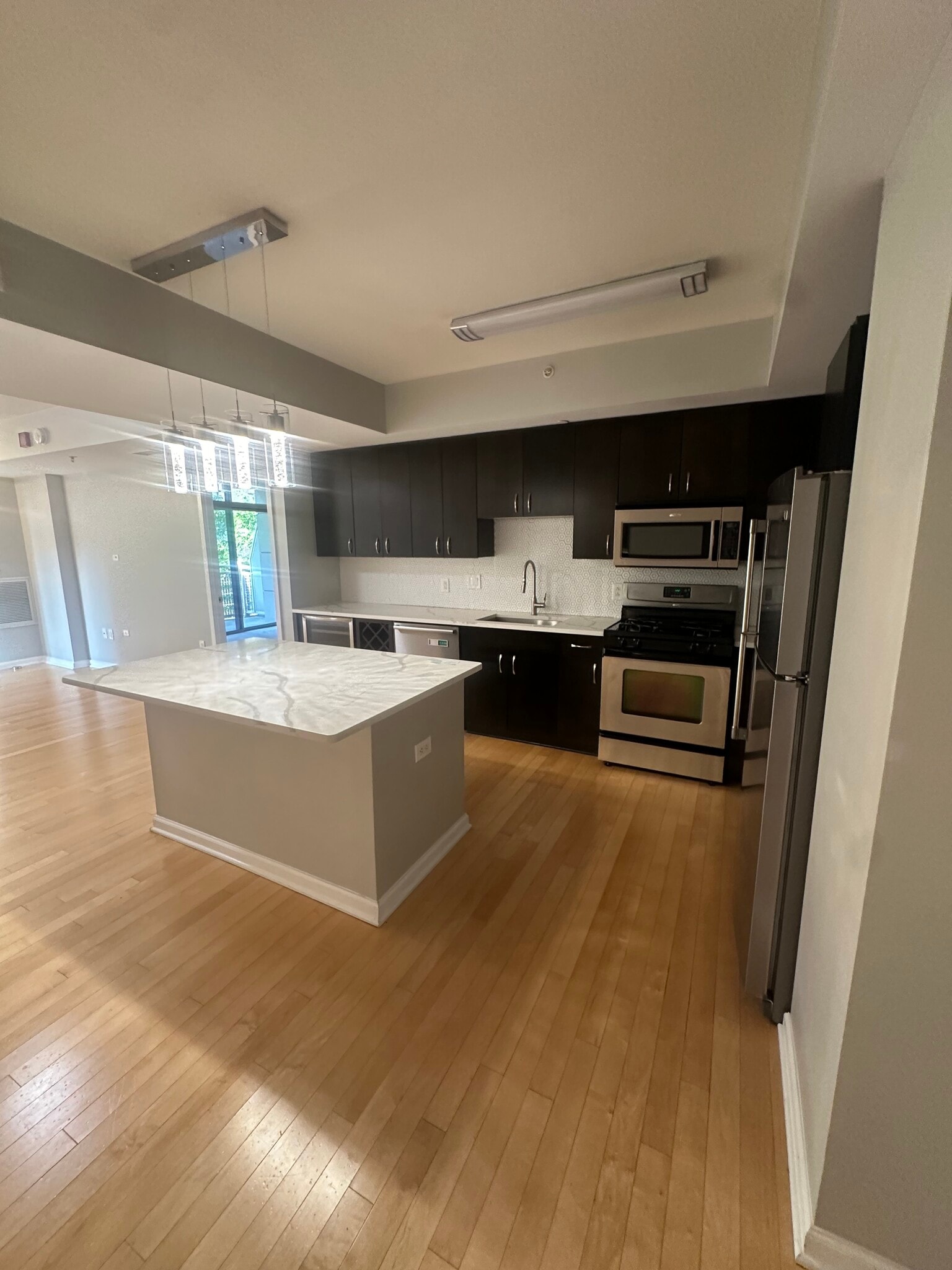 Kitchen from entryway. - 440 L St NW