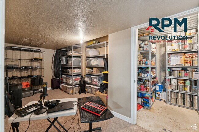 Building Photo - "Spacious 6-Bed Gem with Granite Touches & Cozy Fireplace in Morgan!"