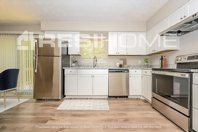 Building Photo - 3011 Woodfield Dr