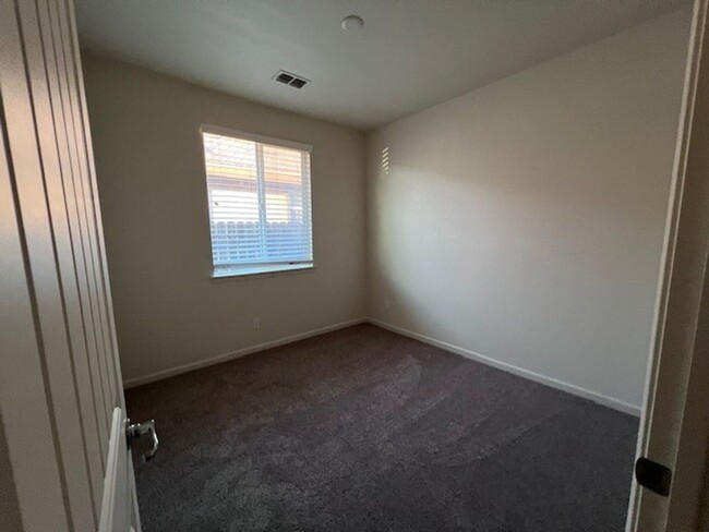 Building Photo - Freshly painted home with new carpet.