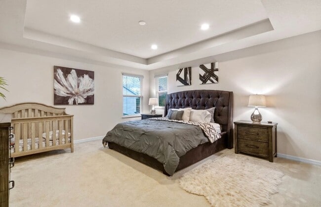 Building Photo - Water Front Home- 4 Large Bedrooms-3 baths Gated Community Call Sheila Campbell 407-687-7900