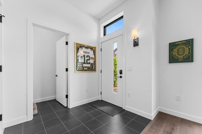 Building Photo - Luxury 3 Story Condo in Exclusive Titletown District