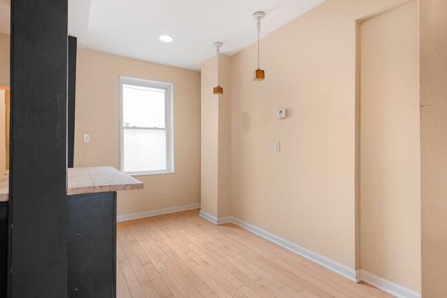 Building Photo - Spacious 2BR/2.5BA Townhome with Finished Basement & Extra Storage