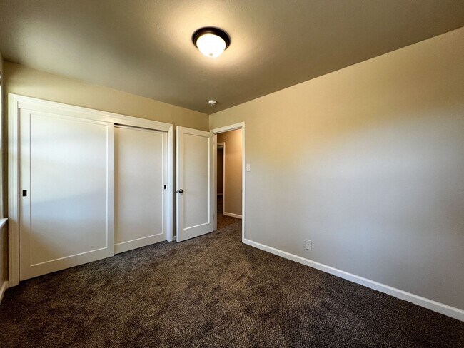 Building Photo - Freshly Renovated 3 Bedroom Home with Large Fenced Yard & Double Garage