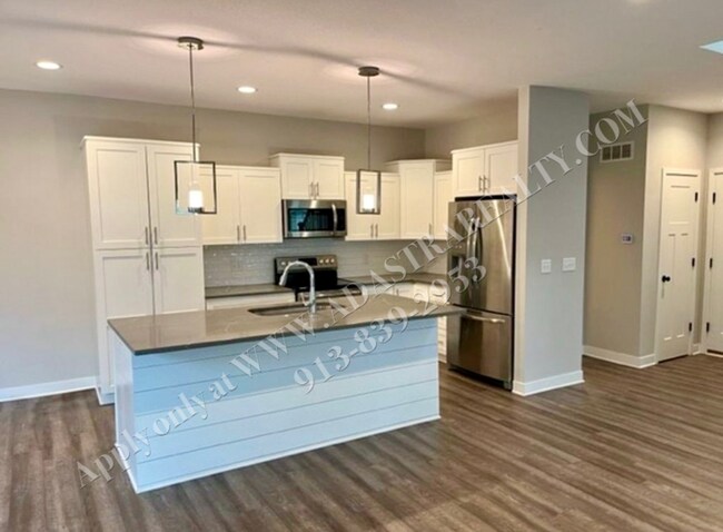 Building Photo - Spacious 4-Bedroom Townhome with Finished Basement in Blue Valley School District-Coming SOON!!