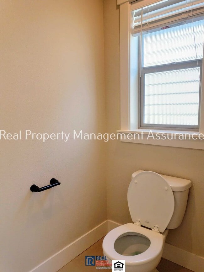 Building Photo - Charming Tudor-Style 4BR / 2.5BA Bethany Home Across from Bethany Creek Park