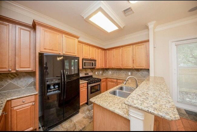 Building Photo - 7103 Windwater Lagoon Dr