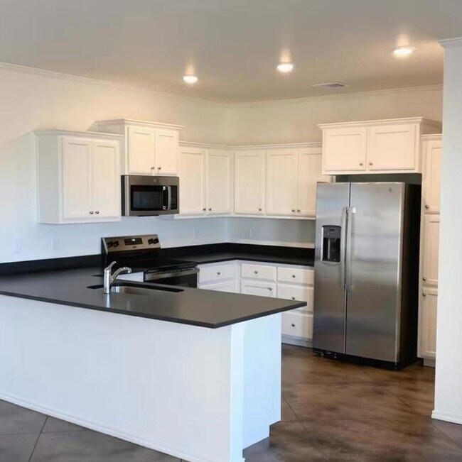 Building Photo - Stunning New 3/2 Townhomes