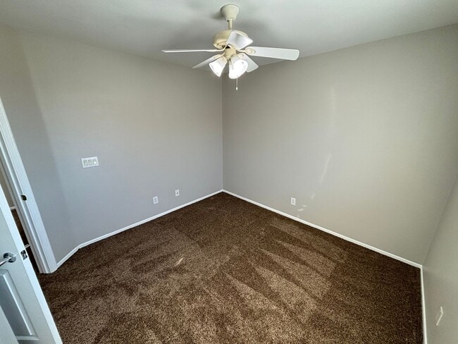 Building Photo - Spacious Tri-Level 4-Bedroom Home with Bal...