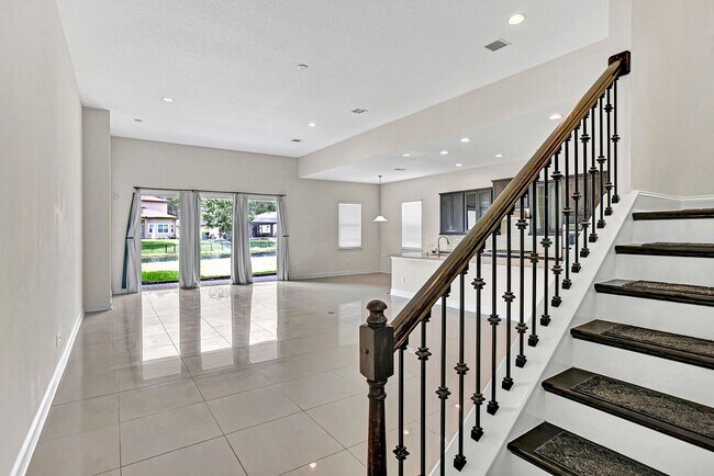 Building Photo - $3,995 Modern 4 Bedroom 3 Bath Gated House in Nocatee. Bonus Office. Amenities. Loft. Pet Friendl...