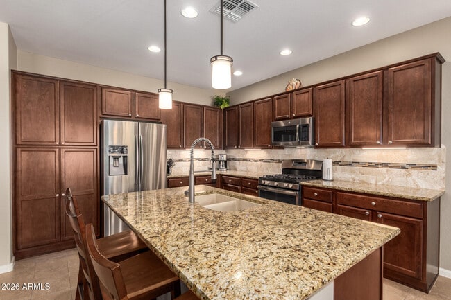 Building Photo - 16508 W Almeria Rd