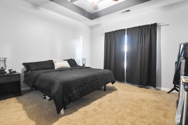 Building Photo - Pet Friendly Three Bedroom with Bonus!